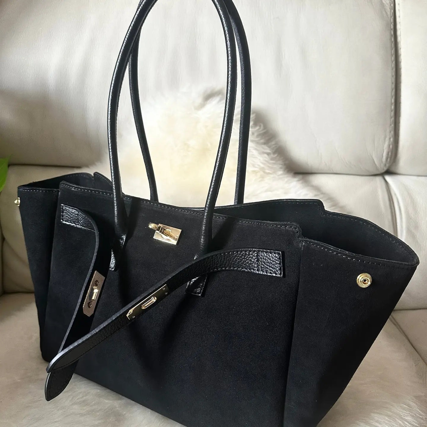 Didelė rankų darbo zomšinė rankinė